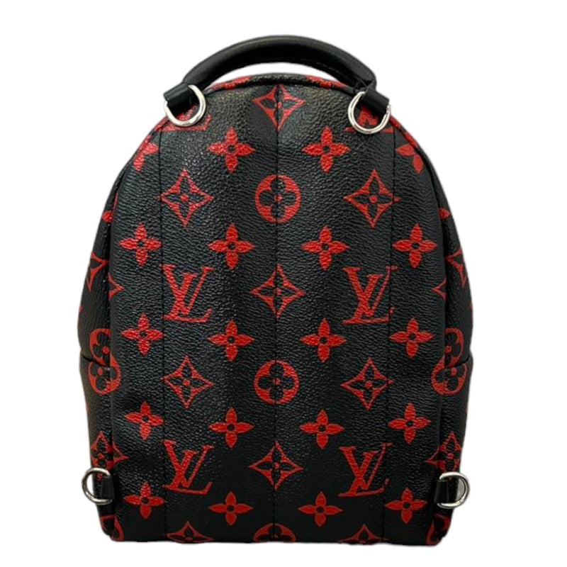 louis vuitton black and red monogram backpack Preloved Palm Springs PM Limited Edition Monogr KimmieBBags LLC The Palm Springs Infrarouge PM features a monogram canvas body Discovery Backpack MM