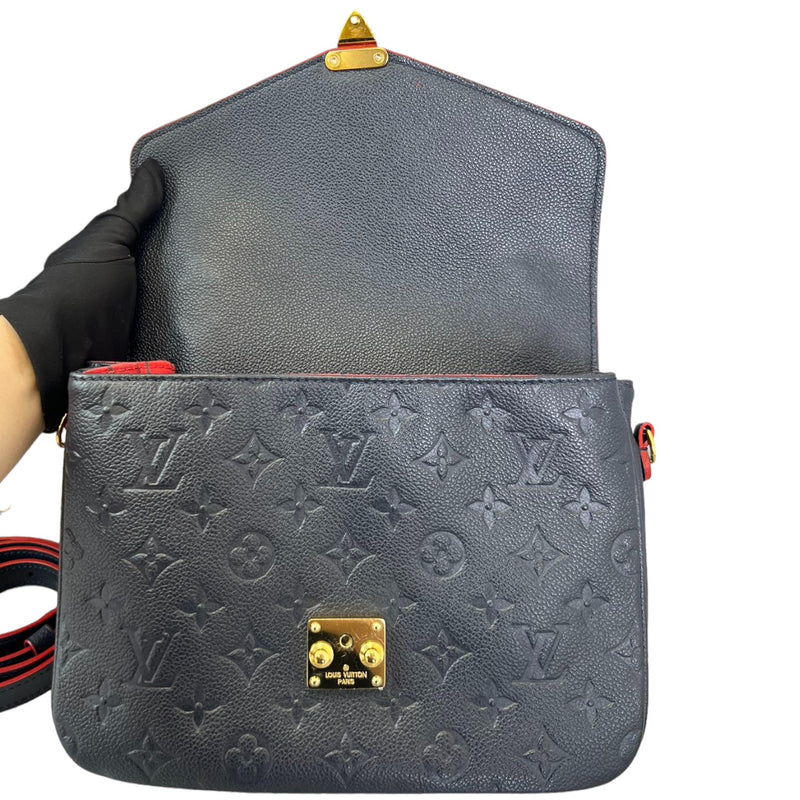 Pochette Metis Empreinte Blue GHW