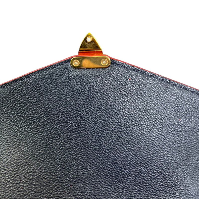 Pochette Metis Empreinte Blue GHW