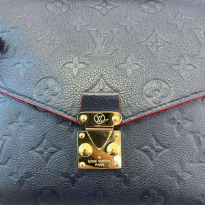 Pochette Metis Empreinte Blue GHW