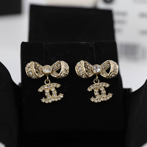 Gold and Crystal Ribbon CC Earrings
