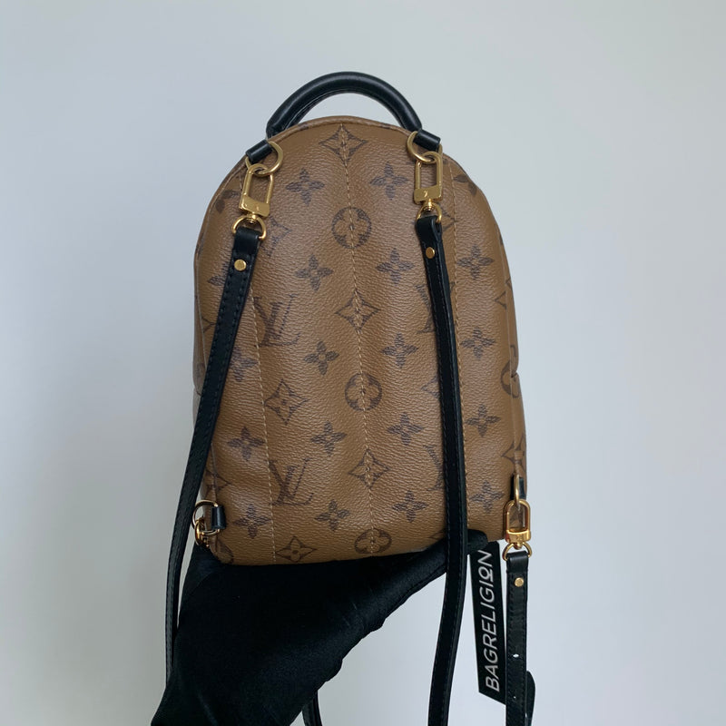 reverse monogram canvas backpack