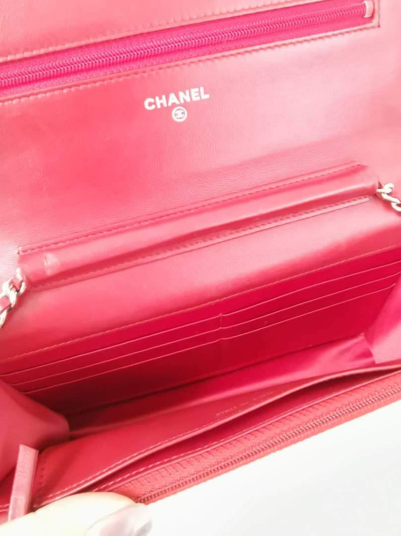 Pre-loved authentic Chanel Camellia Lambskin Pink Wallet on Chain