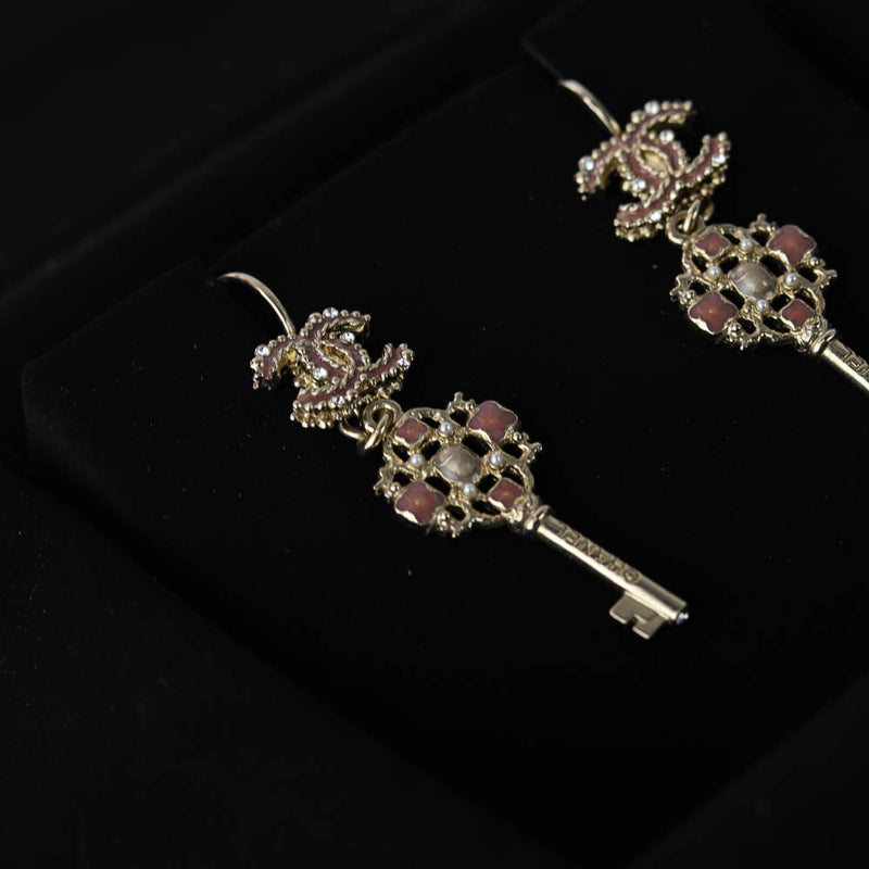 Dangling CC Key Piercing Earrings