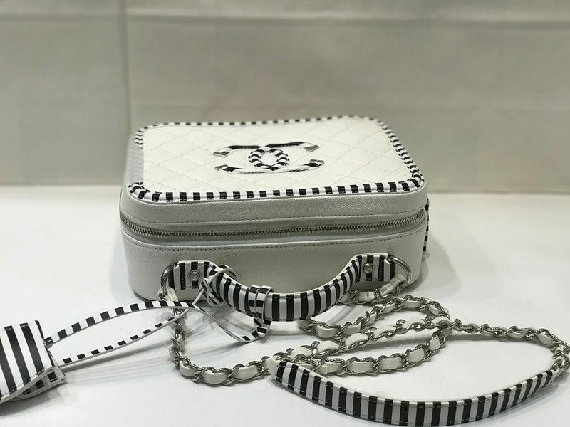 Black and White Striped CC Filigree Medium Caviar Quilted Vanity Case