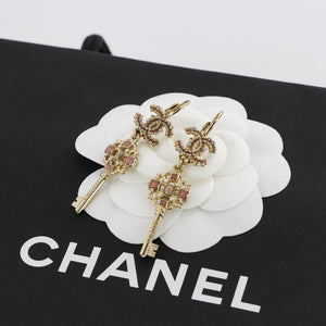 Dangling CC Key Piercing Earrings