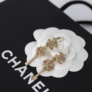 Dangling CC Key Piercing Earrings