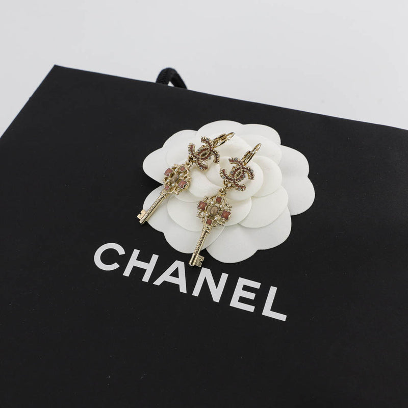 Dangling CC Key Piercing Earrings
