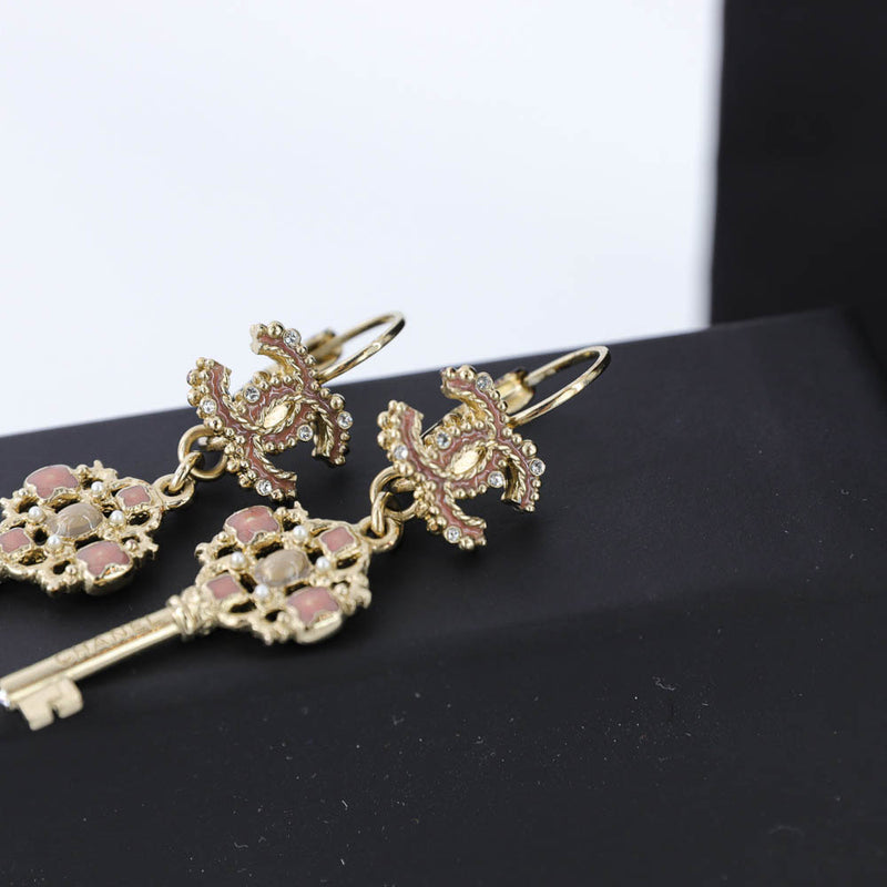 Dangling CC Key Piercing Earrings