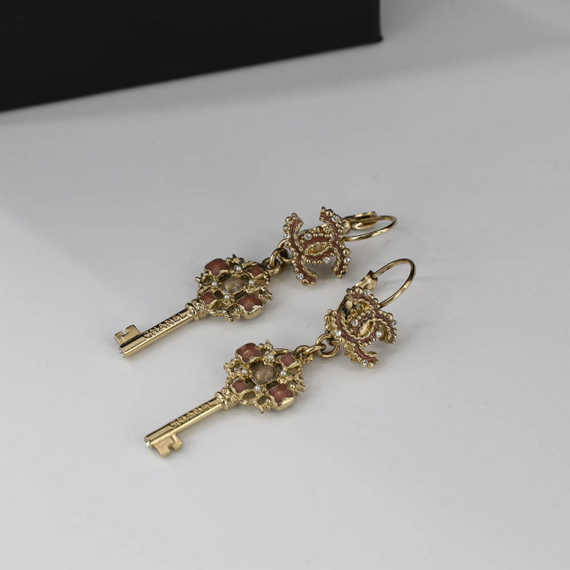 Dangling CC Key Piercing Earrings