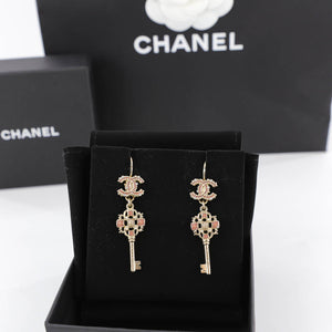 Dangling CC Key Piercing Earrings