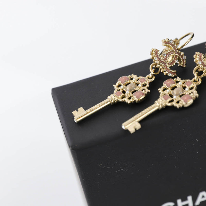 Dangling CC Key Piercing Earrings