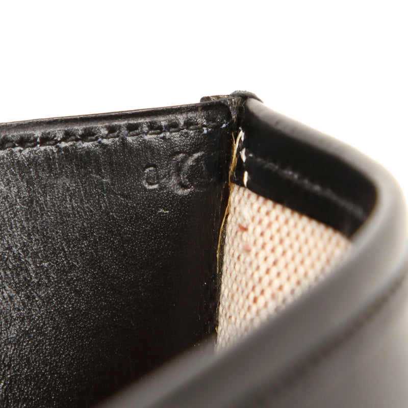 Black Jige GM Leather Clutch Bag