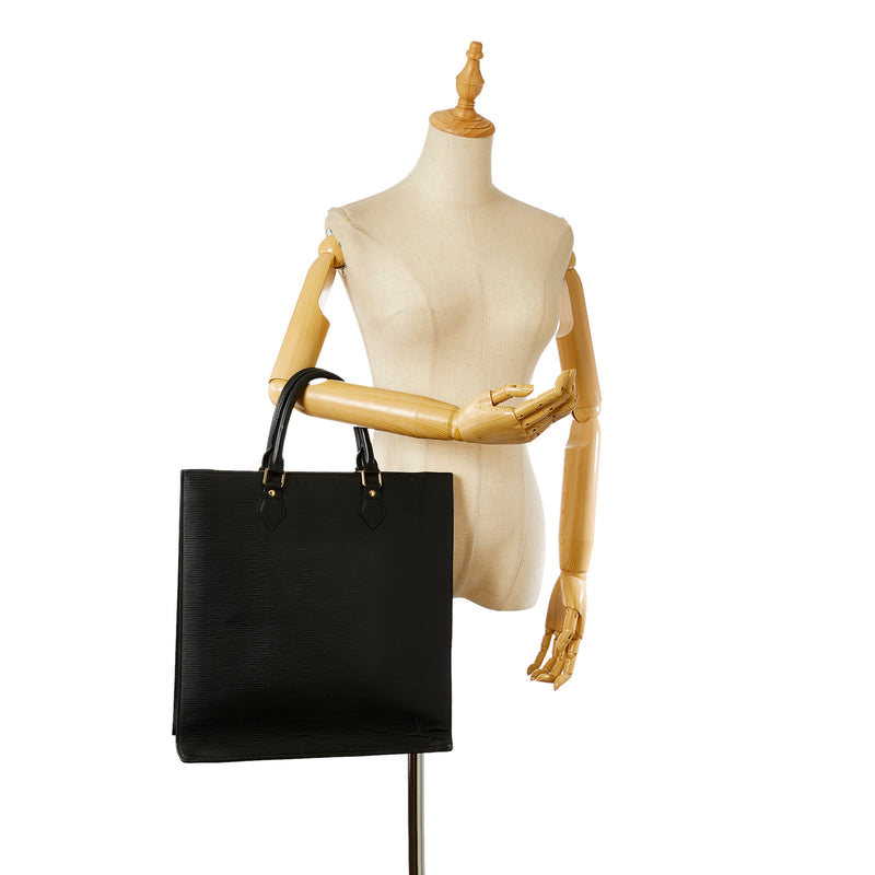 Sac plat PM Epi Leather - Handbags