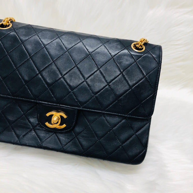Chanel mid flap black leather vintage ref. 7665