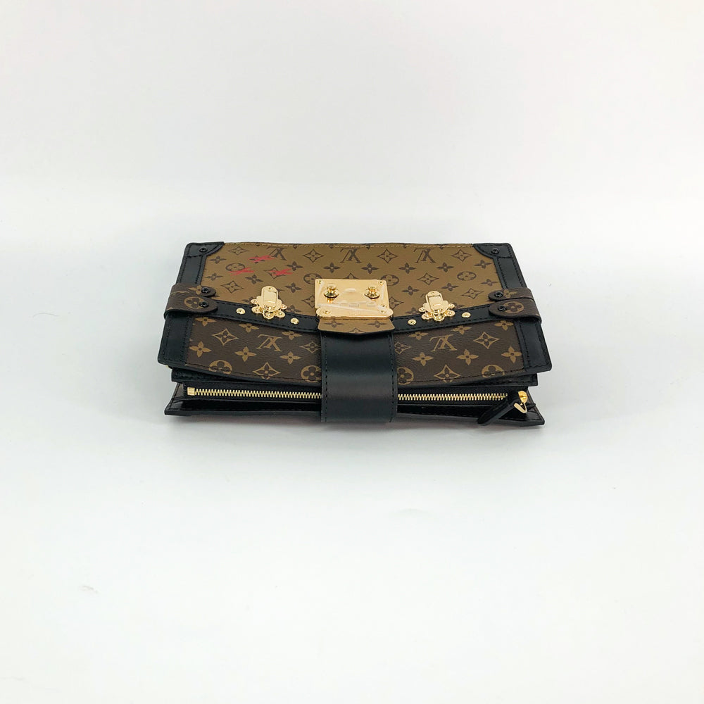 Reverse Monogram Trunk Clutch – Bag Religion