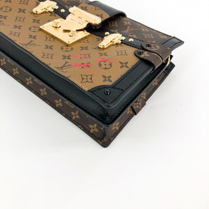 Reverse Monogram Trunk Clutch