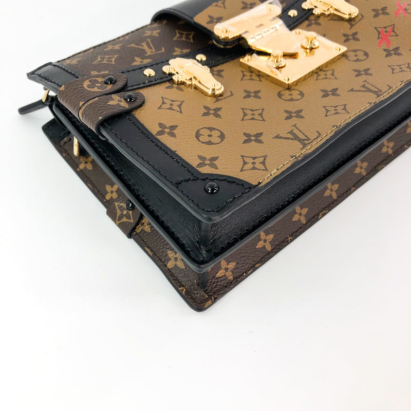 Reverse Monogram Trunk Clutch