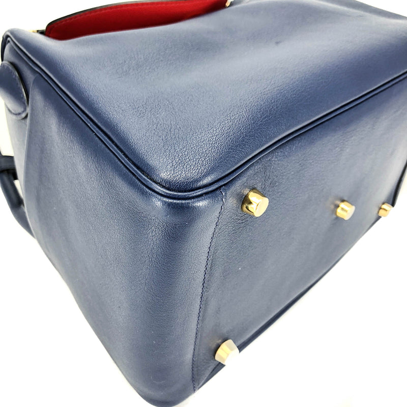 Lindy 30 in Blue Nuit with Rouge Tomate Interior