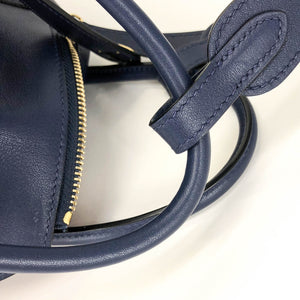 Lindy 30 in Blue Nuit with Rouge Tomate Interior