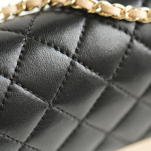 Mademoiselle Vintage Flap Bag in black and beige shiny sheepskin leather