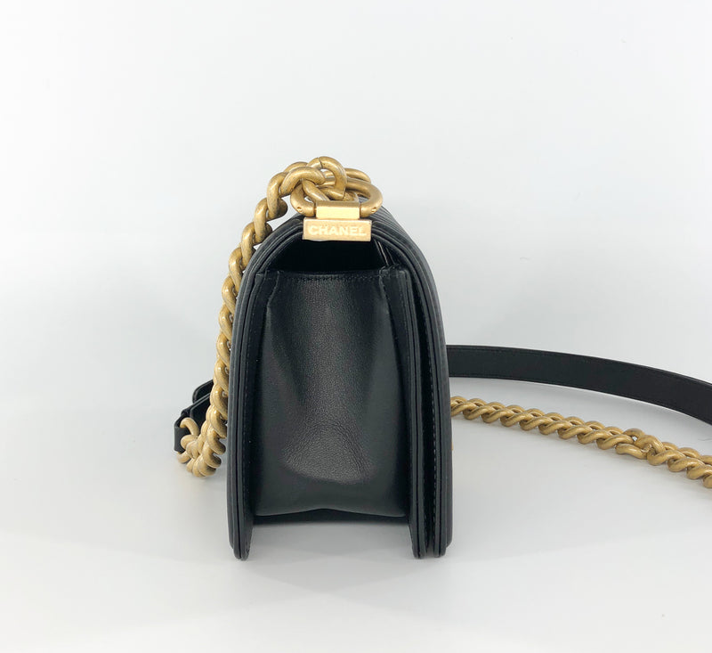 Chanel Small Chevron boy bag in black lambskin leather aged gold