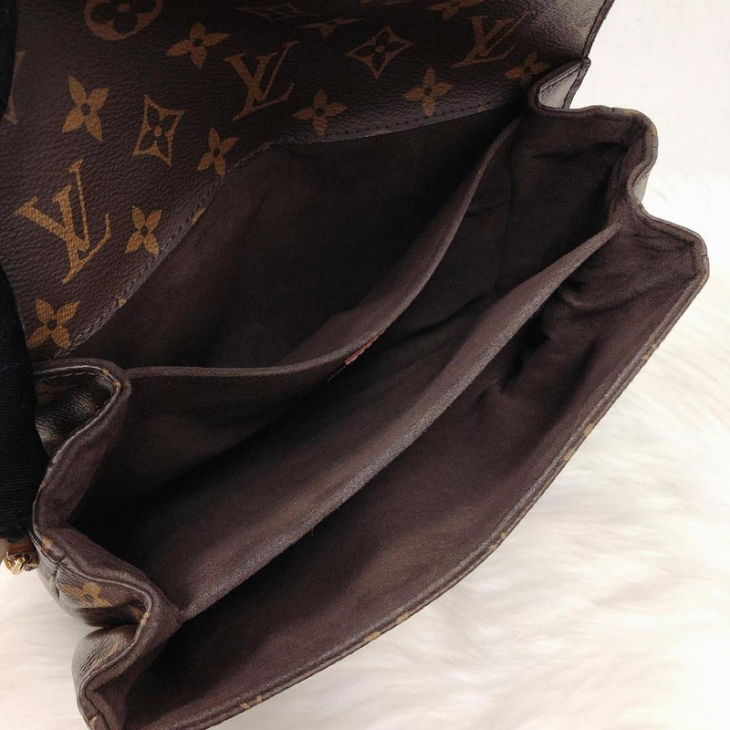 Pochette Metis Leather Monogram