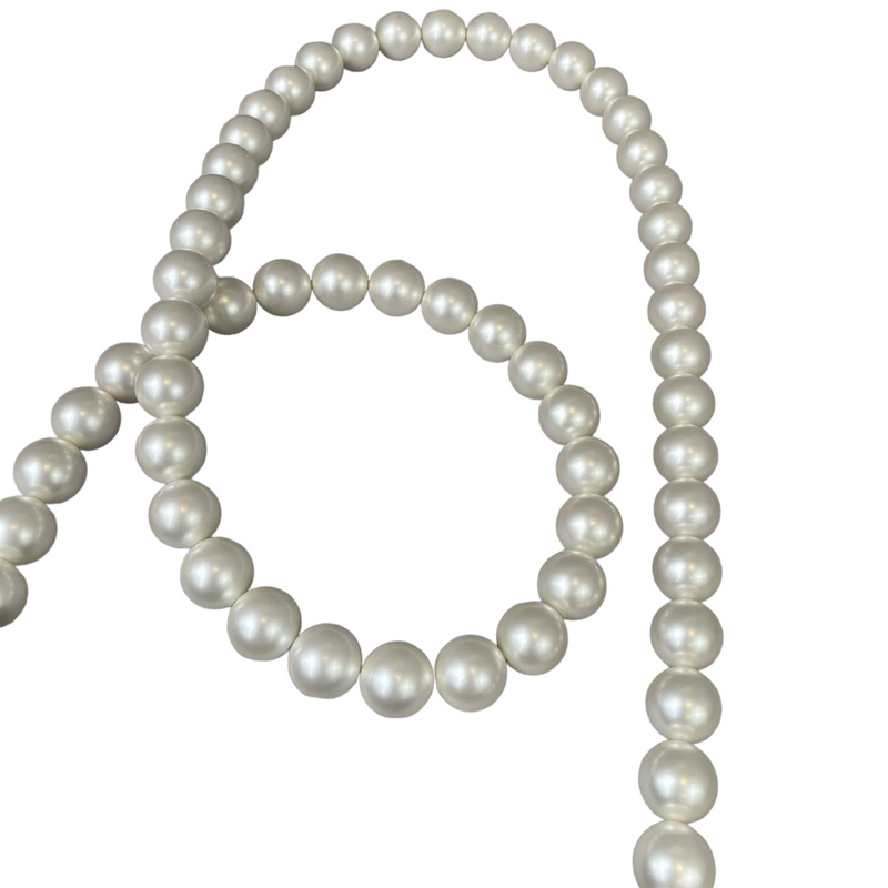white pearl chanel bag black