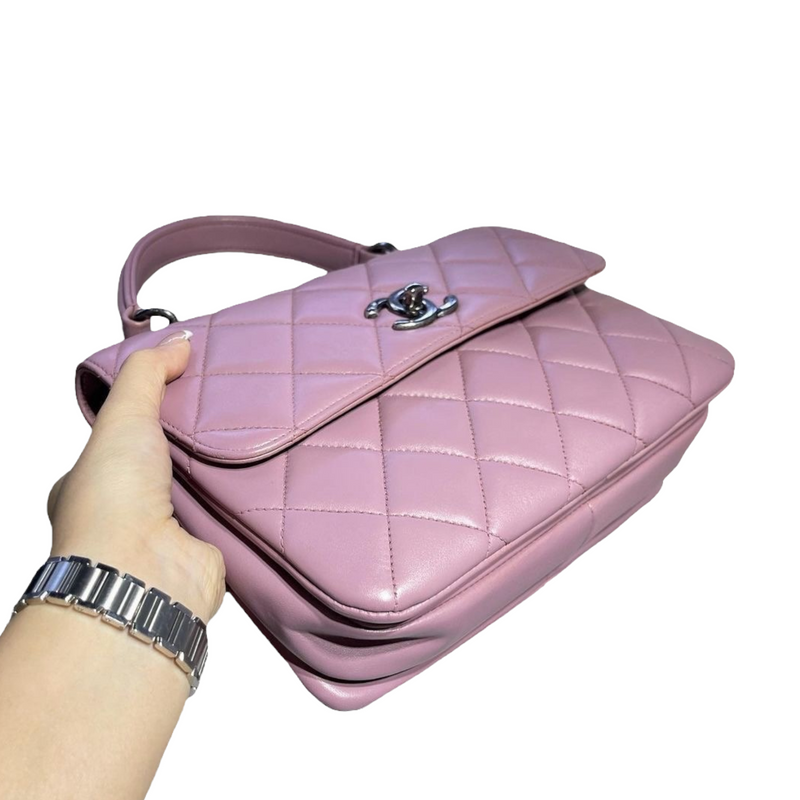 flap bag with top handle