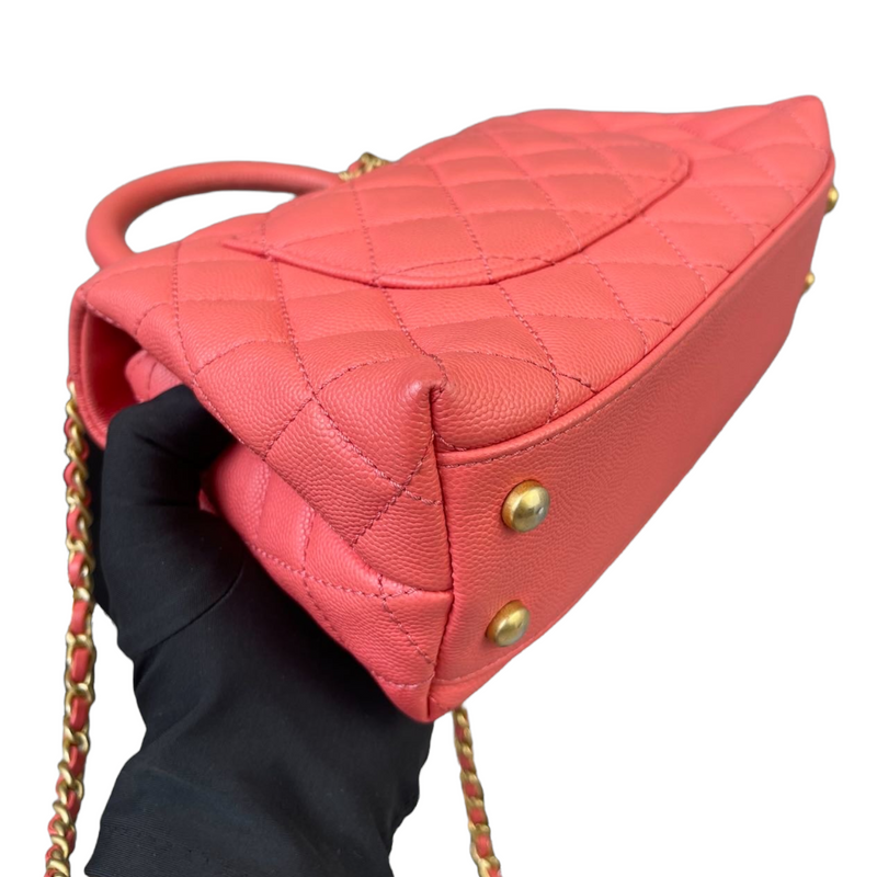 CHANEL Mini Coco Handle Flap Bag in Coral Red Caviar