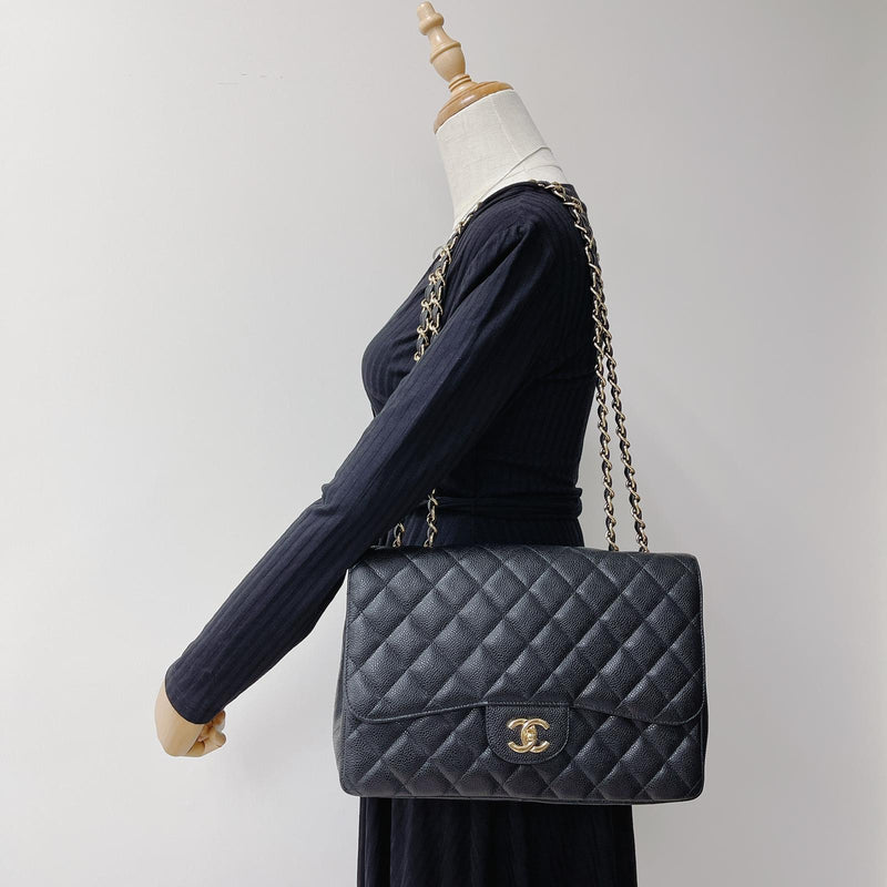 Buy CHANEL Black Caviar Quilted Jumbo Classic Flap LGHW